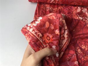 Velour - blomsterprint i velour og røde toner
